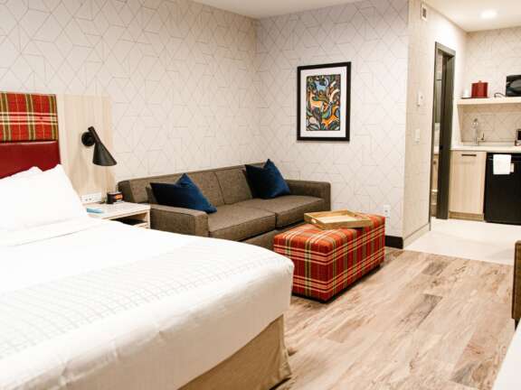 Dog Friendly: Pet-friendly hotel room at Mountaineer Lodge, Lake Louise, ground floor with exterior access in the Timber Building.