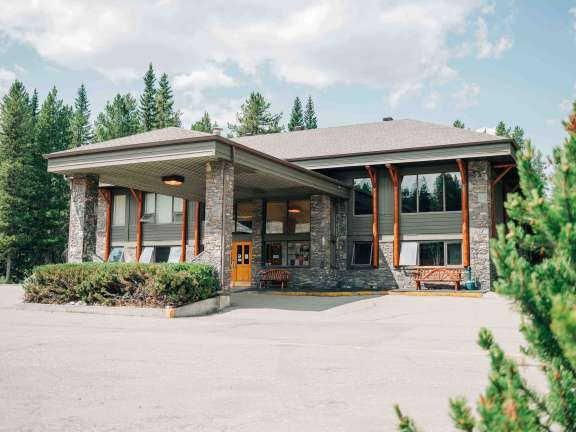 Front Doors of Mountaineer Lodge Main Building on a sunny day
