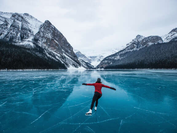Skater Danielle Gillard skating on Lake Louise Banff National Park