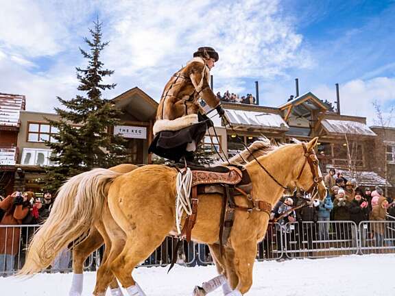Banff skijoring during SnowDays with amazing outfits, a popular winter event for guests staying at Mountaineer Lodge