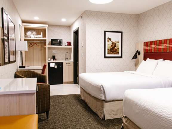Mountaineer Lodge Two Queen Hotel Room in Rocky Mountain Accommodations Lake Louise Alberta