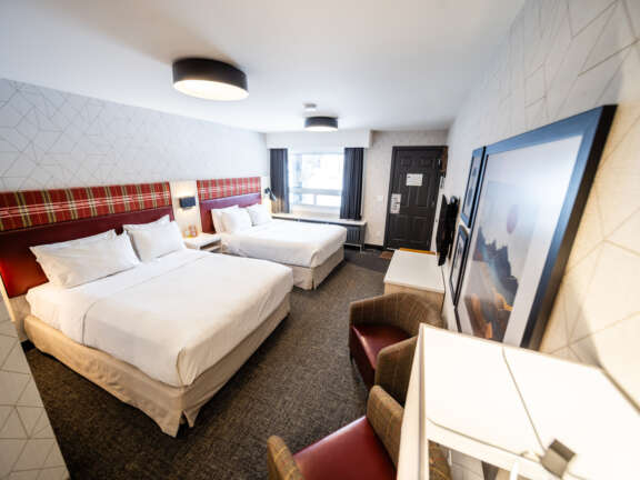 Mountaineer Lodge Two Queen Hotel Room in Rocky Mountain Accommodations Lake Louise Alberta