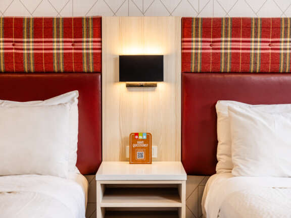 Mountaineer Lodge Two Queen Hotel Room in Rocky Mountain Accommodations Lake Louise Alberta